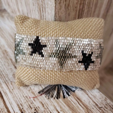 Brazalete plata con estrella negra
