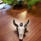 Dije torito blanco con contorno glitter gris
