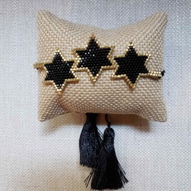 Pulsera 3 estrellas negra con pompón