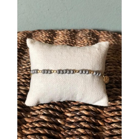 Pulsera cuentitas Gris y dorado