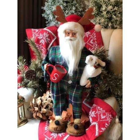 Santa en pijama de cuadros verdes