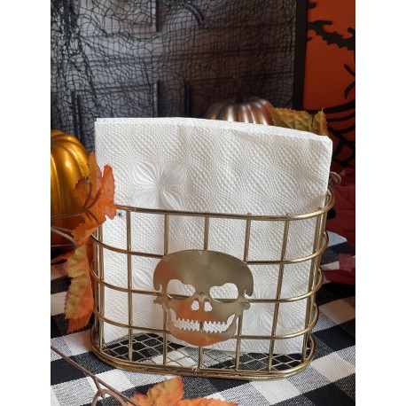 Servilletero dorado con calavera